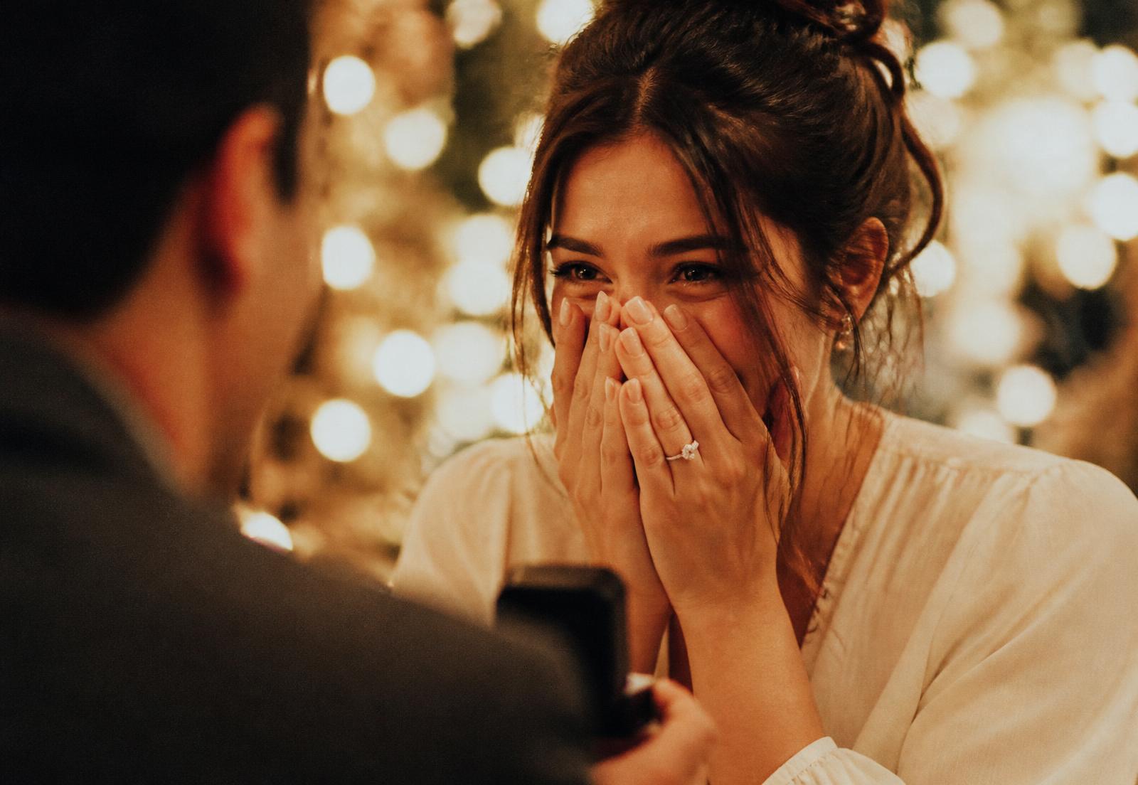 A woman's overwhelmed reaction in the seconds after being proposed to